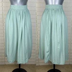 Mint green contemporary, pleated, pull on  midi length skirt, size extra large